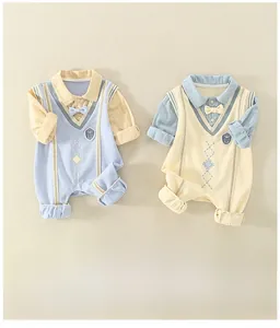 Detail of preppy baby rompers with V-neck vest design and delicate embroidered badges