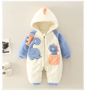 Close-up of baby warm hooded romper with soft fleece texture and cute dinosaur embroidery