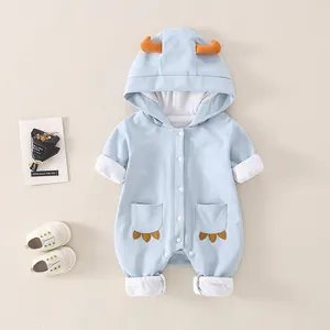 Light blue hooded baby bodysuit with orange horns and cute claw pocket details
