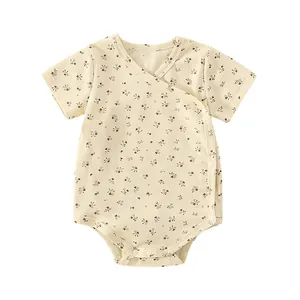 Body de bebé de manga corta en algodón con estampado floral y botones para recién nacido