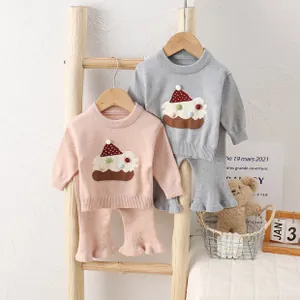 Detailed view of baby knit sweater sets with cute 3D cartoon cake design and flared pants