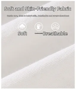 Close-up of soft white cotton knitted fabric showing breathable texture for baby clothing