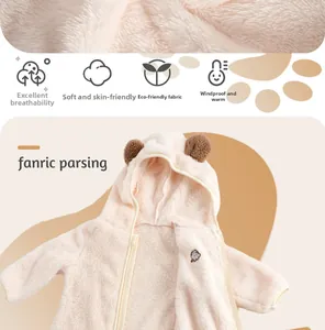 Detail of pink fleece baby romper showing breathable fabric and cute elephant embroidery