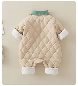 Back view of a diamond quilted baby bodysuit with green collar and warm fleece lining