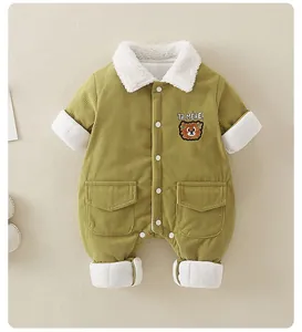 Detailed view of baby corduroy winter romper featuring bear embroidery and fleece collar