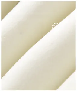 Macro shot of soft breathable plush fabric for winter baby jumpsuit with fluffy texture