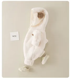 Detail of white double-sided fleece baby romper with cute bear ears and embroidery