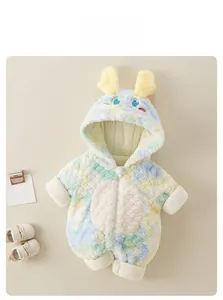 Detail of baby plush romper with yellow bunny ears and colorful rainbow tie-dye pattern