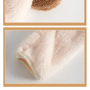 Detailed view of soft double-sided fleece fabric and fine stitching on baby romper