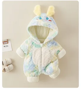 Detail of baby winter romper with monster hood and colorful fluffy faux fur texture