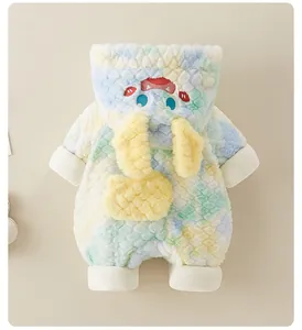 Detail of colorful fuzzy baby winter romper featuring cute monster hood and soft fleece