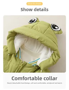 Close-up of green frog hood with soft fleece lining and striped collar on baby romper