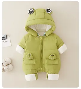 Detail of baby winter jumpsuit featuring cute green frog hood and dual zipper design