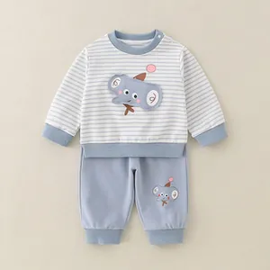 Close-up of blue striped toddler sweatshirt with cute elephant embroidery and ribbed cuffs