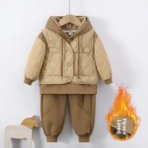 Detail of fleece-lined infant winter set featuring quilted panel and wooden button decor