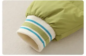 Close-up of baby winter romper striped ribbed cuffs and windproof fabric detail