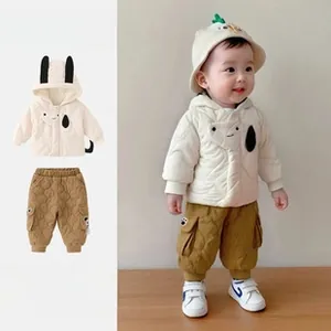 Detail of cream quilted baby hooded jacket with 3D ears and matching khaki cargo pants