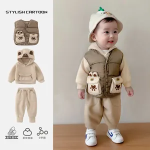 Detail of baby winter vest set with bear ear hood and cartoon animal pockets