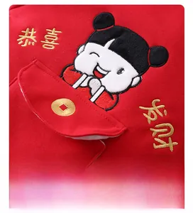 Detailed embroidery of Chinese festive characters and cute cartoon on red baby romper