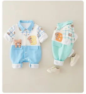 Detail of baby romper featuring waffle knit texture and cute bear patchwork