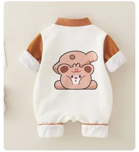 Detail view of cotton baby romper featuring a cute cartoon bear print on the back
