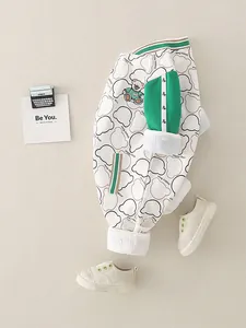 Infant spring cotton bodysuit with cartoon bear print and green contrast sleeve detail