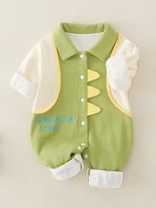Green dinosaur themed waffle cotton baby romper with buttons and yellow spikes