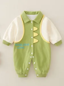 Infant cotton dinosaur romper in green and cream waffle knit with spiked side details