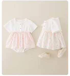Detail of baby summer short sleeve bodysuit with pink balloon print and soft cotton fabric