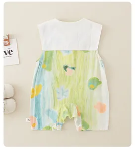 Close-up of baby romper showing breathable cotton fabric and colorful abstract pattern