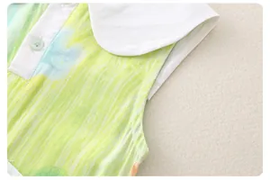 Detail of girls cotton romper featuring a Peter Pan collar and vibrant tie-dye print