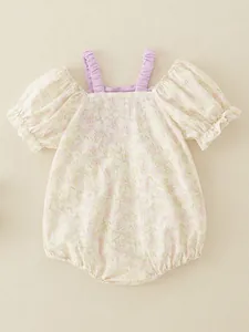 Sweet floral baby girl cotton romper with purple ruffle straps and puff sleeves