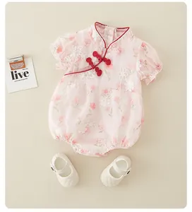 Detail of pink floral baby romper with traditional Chinese collar and embroidery