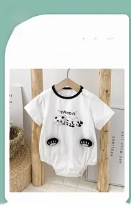 Detail of baby cotton bodysuit featuring cute panda print and functional snap shoulder