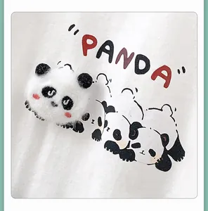Detail of baby onesie with 3D plush panda head and panda letter print on soft fabric