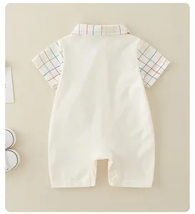 Detailed back view of baby romper featuring rainbow checkered collar and snap buttons