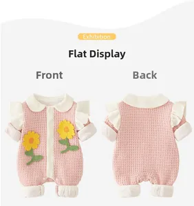 Flat lay view of baby pink romper with sunflower patches and ruffled sleeves, front and back