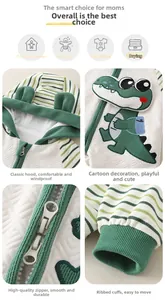 Detail view of baby romper featuring waffle fabric, crocodile patch and smooth double zipper