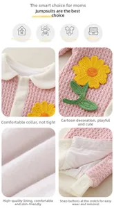 Detail view of pink baby romper showing collared neck, sunflower embroidery and snap buttons