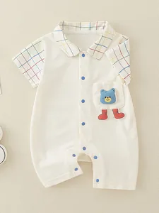 Short sleeve baby romper in cream cotton with plaid collar and cute bear patch