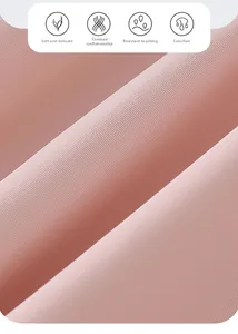 Detail of pink skin-friendly fabric showing refined combed texture and pilling resistance