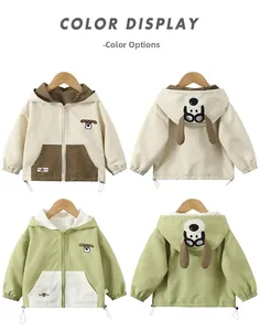Detail of windproof kids hooded jacket with cartoon dog ears and color block design