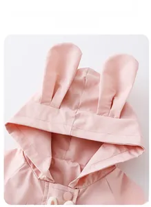 Detail of pink toddler windbreaker featuring cute 3D bunny ears on the hood with snaps