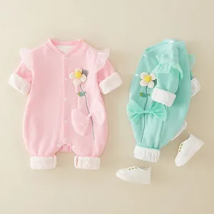 Baby girl waffle knit rompers in pink and mint green with floral embroidery and mesh bows