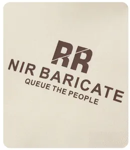 Detailed macro view of the premium cotton fabric with brown minimalist letter printing