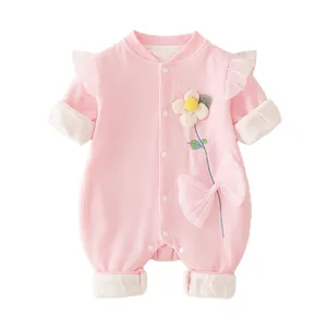 Pink waffle knit baby girl long sleeve romper with floral appliques and ruffle shoulders