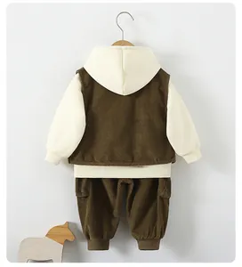 Rear view detail of boys' 3-piece set featuring cream hoodie and brown corduroy vest