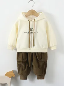 Three-piece boy's spring set featuring a beige hoodie and olive corduroy cargo pants