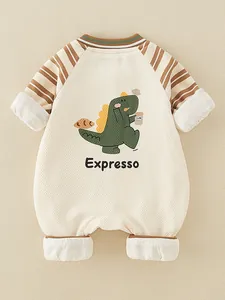 Infant cotton romper with waffle texture and cartoon green dinosaur print in cream