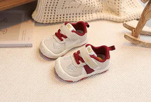 Detail of baby toddler shoes with breathable mesh and anti-slip sole on a cozy background